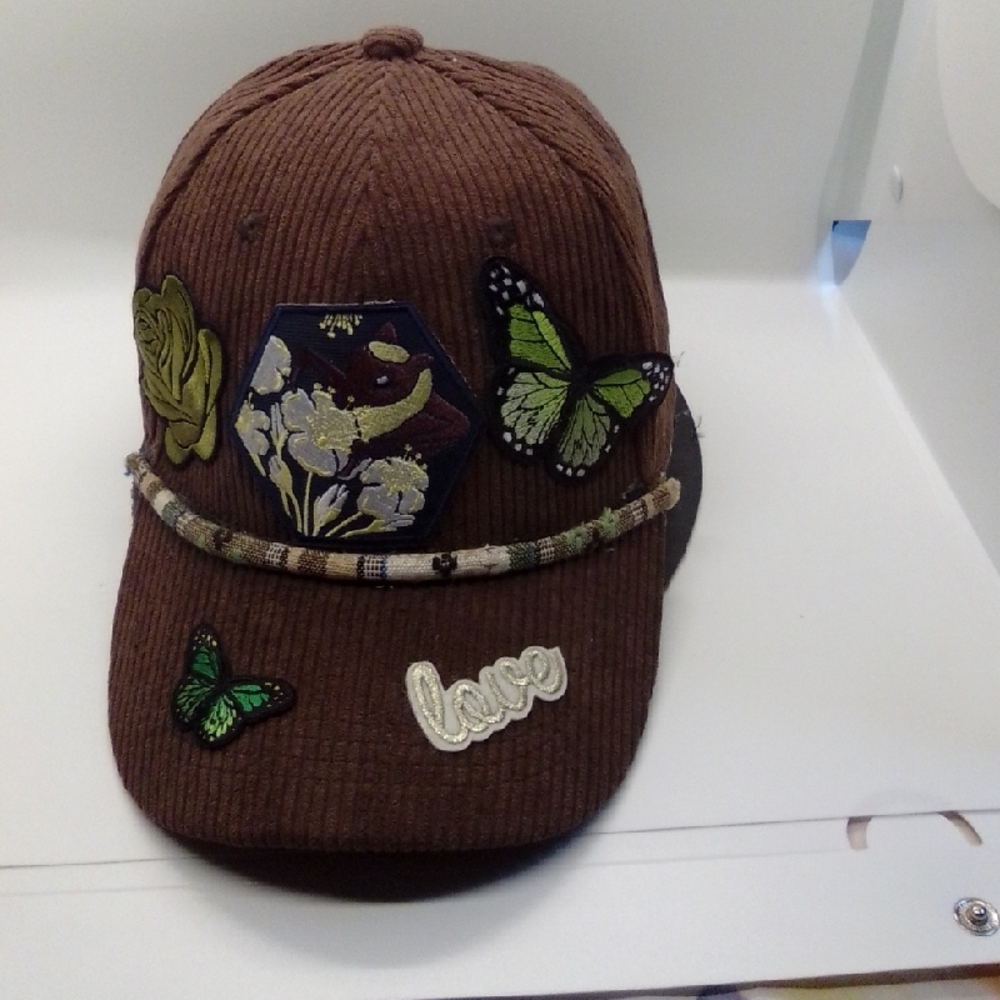 Hand Crafted Brown and Green Hats with Unique Designs